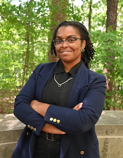 Alexis Cameron Outside in Woods Smiling