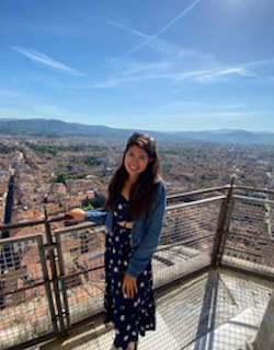 Isabella Fox with view over city